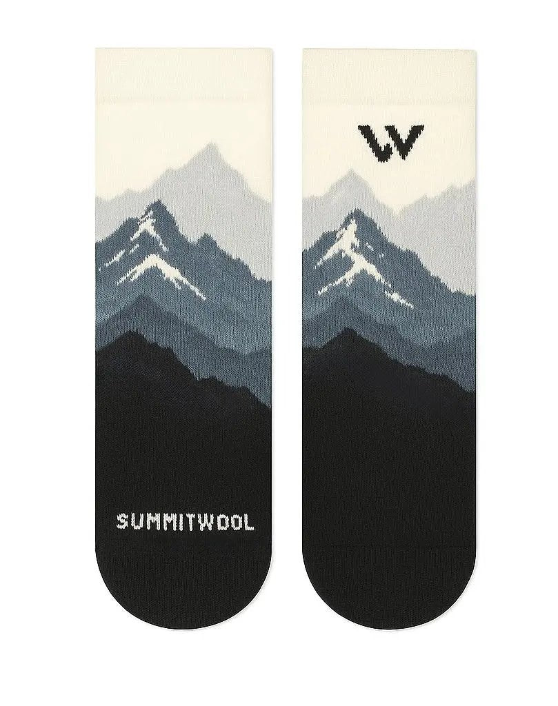 Rocky Winter Peaks merino crew socks — glacier gray to black gradient